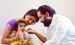 എന്റെ രാജകുമാരിയുടെ ചോറൂൺ; മകളുടെ ചിത്രങ്ങളുമായി ദിവ്യ ഉണ്ണി