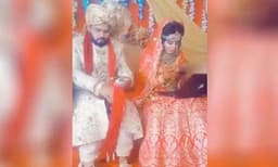 വർക്ക് ഫ്രം 'വിവാഹ വേദി'! വിവാഹവേദിയിൽ ലാപ്ടോപ്പുമായി നവവധു, വൈറലായി വിഡിയോ