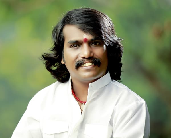ധനുഷ് ചി​‍ത്രത്തില്‍ തരംഗമായി സന്നിധാനന്ദന്റെ ഗാനം; പരിമിതികളെ അതിജീവിച്ച പാട്ടുകാരന്‍