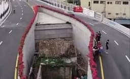 ഹൈവേയുടെ ഒത്ത നടുക്കൊരു വീട്ടിൽ താമസിക്കുന്ന സ്ത്രീ...മാറണമെങ്കിൽ നാല് ഫ്ളാറ്റുകൾ വേണമത്രേ...