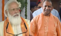 കോവിഡ് കൈകാര്യം ചെയ്തതില്‍ യു.പി. മാതൃകയെന്ന് പ്രധാനമന്ത്രി ; ഗംഗയില്‍ കൂടി മൃതദേഹം ഒഴുകി നടന്നതാണോ മാതൃകയെന്ന് വിമര്‍ശകര്‍