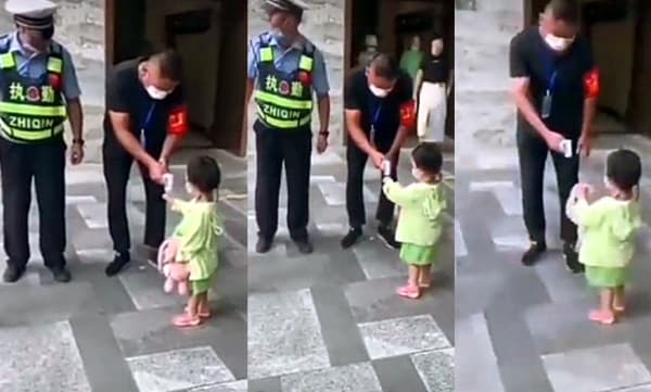 എന്റെ പാവക്കുട്ടിക്കു പനിയുണ്ടോന്നു നോക്കുമോ ? സെക്യൂരിറ്റി​യോടു കുഞ്ഞ് പെണ്‍കുട്ടി; വീഡിയോ വൈറല്‍