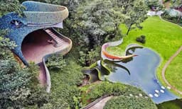 കൂറ്റൻ സർപ്പത്തിന്റെ ആകൃതിയിൽ വീട്; ഉള്ളിൽ കൗതുകകാഴ്ചകൾ