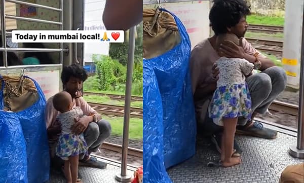 Little girl feeding her father (Image Source: Twitter)