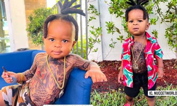 പിഞ്ചുകുഞ്ഞിന്റെ ശരീരത്തില്‍ നിറയെ ടാറ്റുകളും സ്വര്‍ണ മാലകളും; സിനിമ പ്രചോദനമായെന്ന് അമ്മ, വിമര്‍ശിച്ച് കാണികള്‍