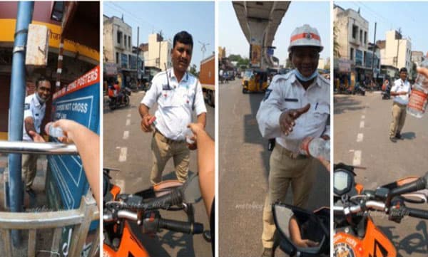 ഇനി പണി വെള്ളം കുടിച്ചിട്ട്; പൊരിവെയിലത്ത് ജോലി ചെയ്യുന്ന പോലീസുകാര്ക്ക് വെള്ളം നല്കി യാത്രക്കാരന്; വീഡിയോ വൈറല്