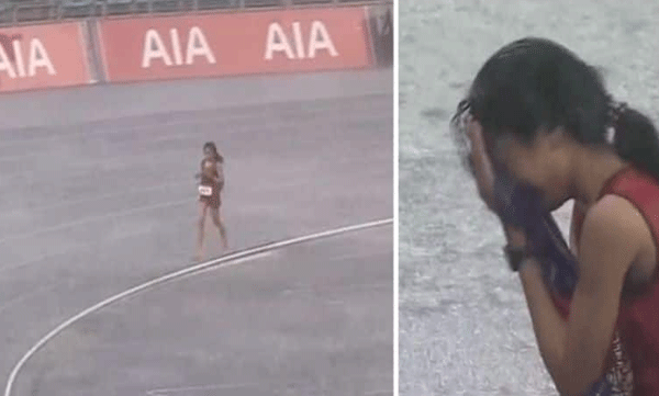  കാറ്റും മഴയും പ്രതിസന്ധിയായി ; ഒടുവില്‍ മത്സരം പൂര്‍ത്തിയാക്കാന്‍ അത്‌ലറ്റിന് ഗംഭീര കൈയ്യടിയേകി കാണികള്‍