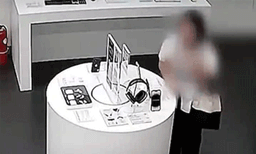 ആന്റി തെഫ്റ്റ് കേബിൾ‌ കടിച്ചു മുറിച്ചശേഷം; കടയില്‍ നിന്നു  ഐഫോൺ  കവര്‍ന്ന് യുവതി