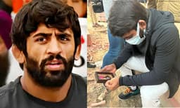  പത്മശ്രീ പുരസ്‌കാരം തിരികെ നൽകി  ബജ്‌റംഗ് പുനിയ, പ്രധാനമന്ത്രിയുടെ വസതിക്ക് മുന്നിലെ നടപ്പാതയിൽ വച്ചു