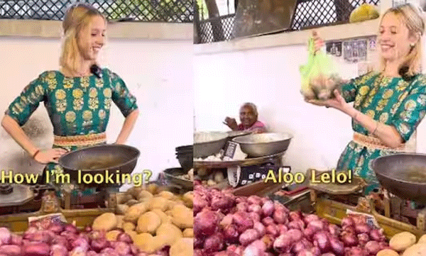 ഇന്ത്യന്‍ തെരുവോരത്ത് പച്ചക്കറി വില്‍ക്കുന്ന റഷ്യന്‍ സുന്ദരി: വൈറലായി വീഡിയോ 
