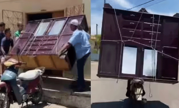 എന്തൊക്കെയാടാ ഈ നടക്കുന്നേ....: കൂറ്റന്‍ അലമാരി സ്‌കൂട്ടറില്‍ കൊണ്ടുപോകുന്ന യുവാവ്, വീഡിയോ കണ്ട് അമ്പരന്ന് നെറ്റീസണ്‍സ് 
