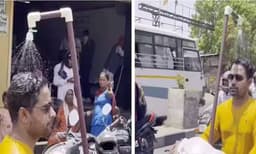 ചൂട് സഹിക്കാന്‍ വയ്യ: സ്‌കൂട്ടറില്‍ ഷവര്‍ പിടിപ്പിച്ച് യുവാവിന്റെ യാത്ര, വീഡിയോ വൈറല്‍ 

