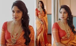 ഓറഞ്ച് പട്ടുസാരിയ്ക്കൊപ്പം ത്രീ ലെയര്‍ പെന്‍ഡന്റ് നെക്ലെസ്സും അണിഞ്ഞ് താരപകിട്ടോടെ നൈല ഉഷ, കല്യാണിന്റെ നവരാത്രി ആഘോഷങ്ങളില്‍ തിളങ്ങി താരം