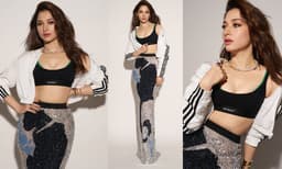 ബ്ലാക്ക് സ്പോർട്ടി ബ്രാലെറ്റിനൊപ്പം സിൽവർ, ബ്ലാക്ക് ആൻഡ് ബ്ലൂ അബ്സ്ട്രാക്റ്റ് പറ്റേണുള്ള സീക്വൻഡ് സ്‌കർട്ടും ധരിച്ച് ഹോട്ട് ലുക്കിൽ തമന്ന ഭാട്ടിയ 