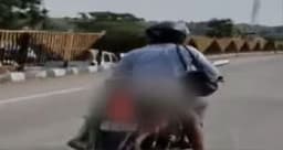 അമിതവേഗതയില്‍ ട്രക്ക് ഇടിച്ചു ഭാര്യ മരിച്ചു ; സഹായത്തിന് നിലവിളിച്ചിട്ട് ആരും വന്നില്ല ; മൃതദേഹം ബൈക്കില്‍ കെട്ടി യുവാവ്