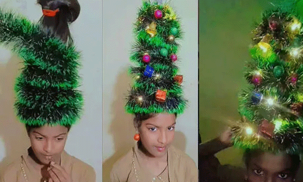 ഇതിപ്പോ ലാഭമായല്ലോ! മുടിയില്‍ ക്രിസ്മസ് ട്രീ പണിയുന്ന കുട്ടി, വൈറലായി വീഡിയോ 
