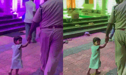 അച്ഛാ എന്നെ കണ്ടില്ലെങ്കില്‍ സ്‌റ്റേഷനിലോട്ട് പോന്നോളു! പള്ളിപ്പെരുന്നാളിനിടെ പോലീസുകാരന്റെ കൈപിടിച്ച് കുരുന്ന് 
