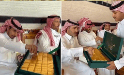 വിവാഹത്തിനെത്തിയ അതിഥികള്‍ക്ക്  സ്വര്‍ണ്ണ ബിസ്‌ക്കറ്റോ? വൈറല്‍ വീഡിയോയ്ക്ക് പിന്നിലെ ആ മധുര സത്യം ഇതാണ്
