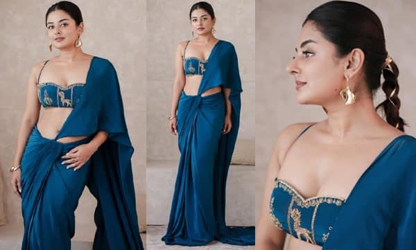 പീകോക്ക് ബ്ലൂ സ്കല്ലോപ്പ്ഡ് സാരിയും സ്ലീവ്ലസ് ബ്ലൗസും ധരിച്ച് ഹോട്ട് ലുക്കിൽ എസ്തർ അനിൽ; ലുക്കിംഗ് സോ ഹോട്ടെന്ന് കമന്റുകൾ 