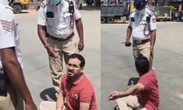 ഗവർണർക്കായി ഗതാഗതം തടഞ്ഞു; ബംഗളൂരു സ്വദേശി റോഡിൽ കുത്തിയിരുന്ന് പ്രതിഷേധിച്ചു
