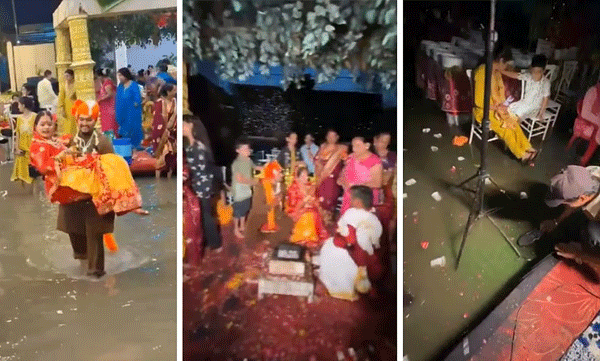 വെള്ളക്കെട്ടിൽ മുങ്ങി വിവാഹവേദി; വധുവിനെ കോരിയെടുത്ത് റൊമാന്റിക് യാത്ര നടത്തി വരന്‍