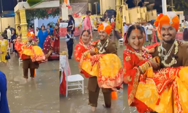 ‘പേമാരിയോ പ്രളയമോ വ​രട്ടെ, നിന്നെ ഞാന്‍ കൈവിടില്ല’; കനത്ത മഴയില്‍ വിവാഹവേദി മുങ്ങി, പിന്നാലെ വധുവിനെ കൈയിലെടുത്ത് വരൻ; വീഡിയോ വൈറല്‍