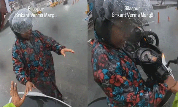 വെള്ളക്കെട്ടിൽ കുടുങ്ങിയ യുവതിയെ രക്ഷപ്പെടുത്തി ബൈക്ക് യാത്രക്കാരൻ; വൈറലായി ഒരു ഹൃദയസ്പർശിയായ ദൃശ്യം
