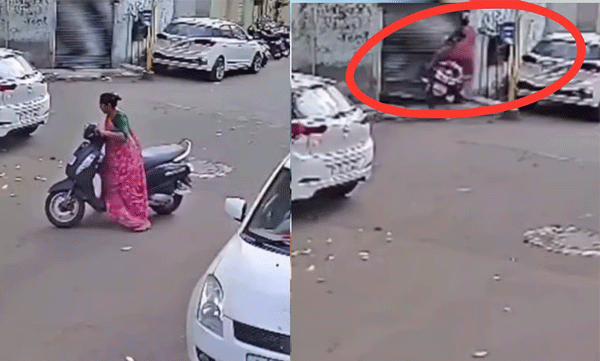 യു-ടേൺ എടുക്കുന്നതിനിടെ നിയന്ത്രണം വിട്ടു; ആക്ടിവയുമായി കടയുടെ ഷട്ടറിൽ ഇടിച്ച് യുവതി, സിസിടിവി ദൃശ്യങ്ങള്‍ വൈറൽ
