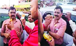 കാലാവധി കഴിഞ്ഞ ബിസ്‌കറ്റ്‌ വായില്‍ തിരുകി ജനക്കൂട്ടം