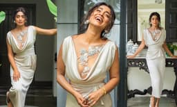 ഡ്രേപ്പുകളും ക്രിസ്റ്റലുകളും നിറഞ്ഞ കൗൾ നെക്ക്‌ലൈൻ ഷാംപെയ്ൻ സാറ്റിൻ ഗൗണില്‍  ഹോട്ട് ലുക്കിൽ ശ്രിയ സരൺ; താരം ​കൂടുതല്‍ ഹോട്ടായെന്ന് കമന്റുകള്‍