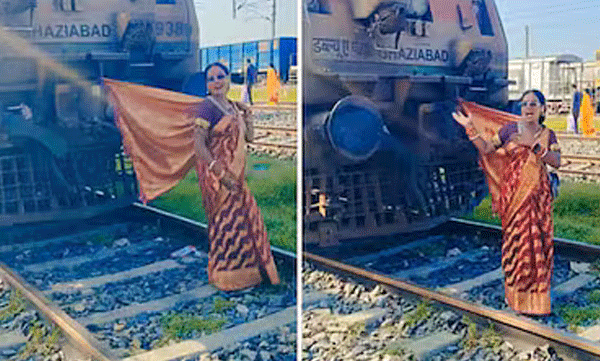 ട്രെയിൻ എൻജിനിൽ സാരിത്തുമ്പ് കെട്ടി, പാളത്തിൽ ചുവടുവച്ച് യുവതി; വൈറൽ റീലിന് രൂക്ഷ വിമർശനം