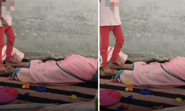 നിലത്ത് കിടന്ന് വിശ്രമിക്കുന്ന അംഗണവാടി ജീവനക്കാരി:  കാലിൽ മസാജ് ചെയ്ത് നൽകി പിഞ്ചുകുഞ്ഞ്; വിഡിയോ ചര്‍ച്ചയാകുന്നു 