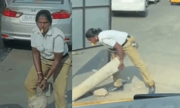 ഒറ്റയ്ക്ക് കോൺക്രീറ്റ് തൂണുകൾ എടുത്തുമാറ്റി, ആംബുലൻസിന് വഴിയൊരുക്കി; വനിതാ ട്രാഫിക് വാർഡന് കയ്യടി