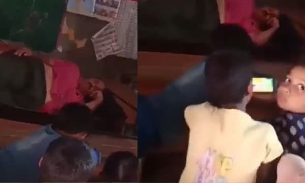 യുപിയിൽ ക്ലാസ് മുറിയിൽ സുഖമായി ഉറങ്ങി അധ്യാപകൻ; മൊബൈലിൽ മുഴുകി വിദ്യാർത്ഥികൾ; വീഡിയോ വൈറൽ!
