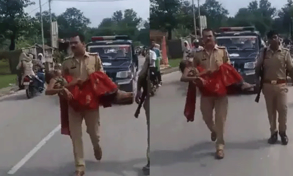 പോലീസ് വാൻ പിന്നിലുണ്ടായിട്ടും പരിക്കേറ്റ സ്ത്രീയെ കൈകളിലെടുത്ത് ഇൻസ്പെക്ടർ; ആശുപത്രിയിലേക്ക് ഓടിയെത്തുന്ന ദൃശ്യങ്ങൾ വൈറൽ